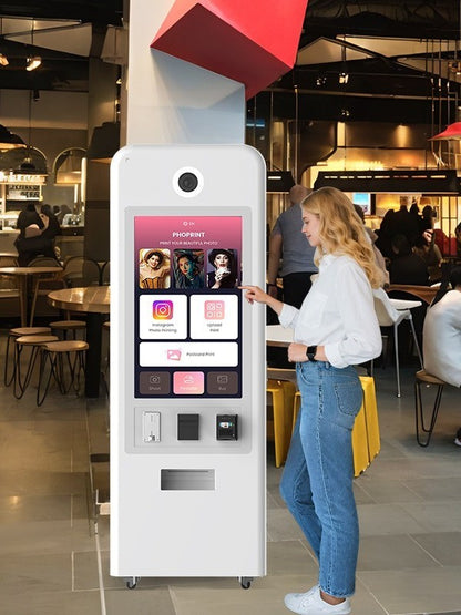 Person interacting with a digital Foto kiosk in a modern indoor setting