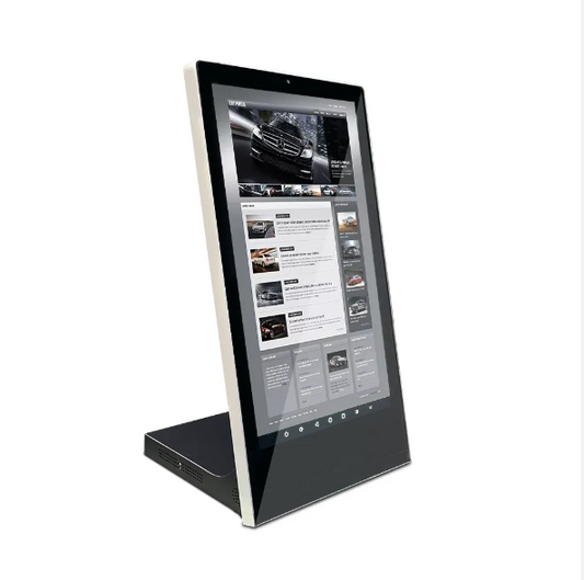 A countertop touchscreen kiosk with a black frame, displaying an image