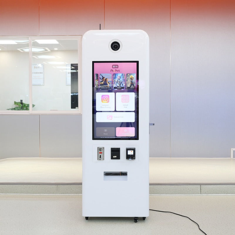 White interactive Foto Kiosk with a screen displaying applications in an indoor setting.