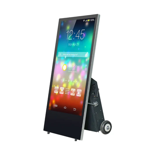 A portable promotional poster display with a 43 inch screen showcasing a colorful digital image. The unit is on a wheeled base, suggesting mobility for indoor or outdoor use.